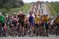 072109ragbraigreenfield - Rodney White/The Des Moines Register - Monday July 20, 2009 - Riders cross Higway 34 into Stanton early Monday morning. RAGBRAI travels from Red Oak to Greenfield Monday.