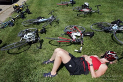 m0723ragbrai - shot 07/22/09 , IA.  Christopher Gannon/The Register --   A rider catches a nap with bikes in Lacona Wednesday on RAGBRAI XXXVII.  (Christopher Gannon/The Des Moines Register)