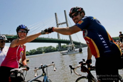 Jim and Jan Robers of Des Moines (South) pound their fists as they celebrate the end of RAGBRAI at the Mississippi. M0726RAGBRAI - RAGBRAI 2009 Saturday July, 25, 2009. Day Seven took riders from Mount Pleasant to Burlington to dip their tires in the MIssissippi. They traveled through New London, Lowell, and Geode State Park.  (Andrea Melendez/The Register)